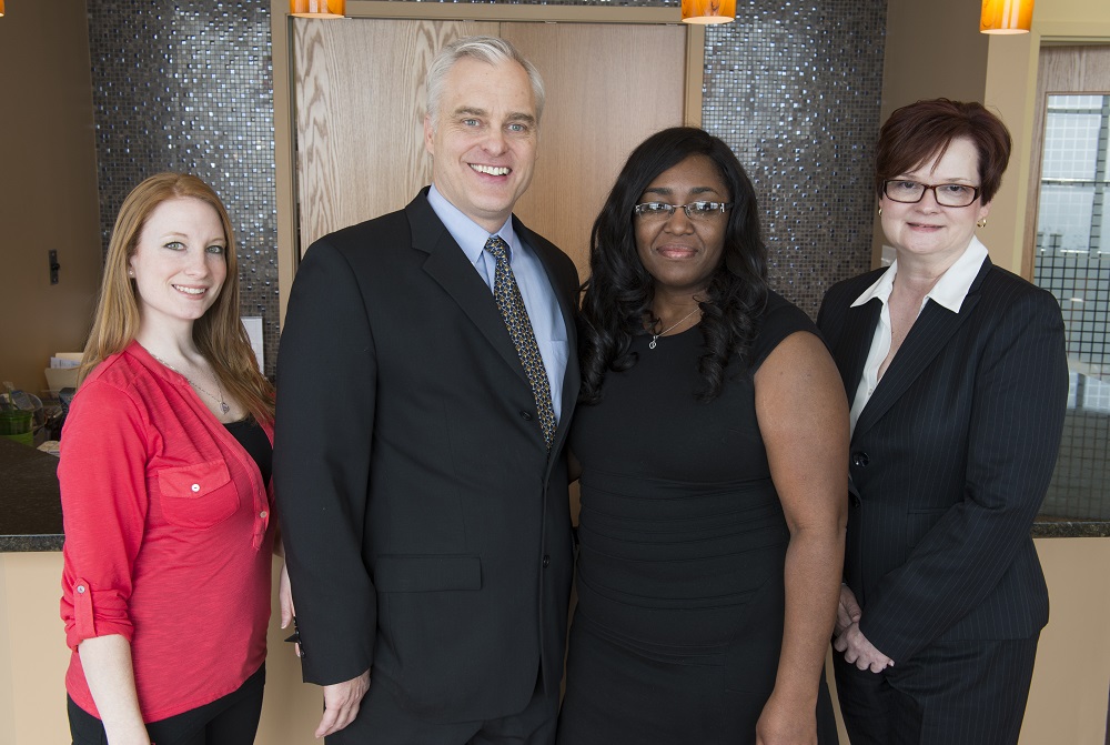 Office Staff at Our Laser Liposuction Center A picture of Dr. Wright with the St. Louis Laser Liposuction Center's office team.