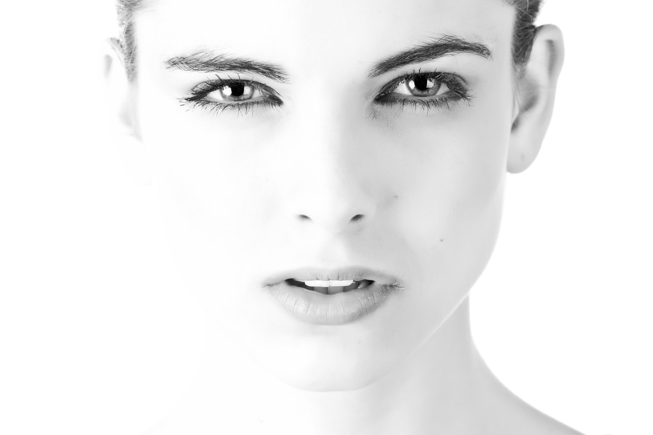 black and white close up of a model's face